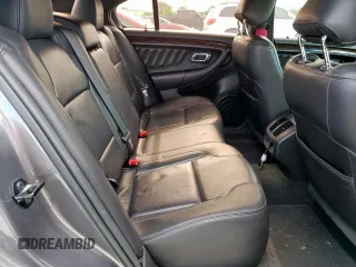 2013 Ford Taurus Limited z VIN 1FAHP2F89DG187913, wystawiony jako Copart lot #57096865 z przebiegiem 93 575 mil mil oraz Szkoda całkowita • Salvage title. Historia ofert i sprzedaży dostępna na DreamBid. Obrazek 10.