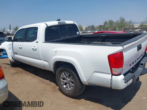 2017 Toyota Tacoma SR5 with VIN 3TMBZ5DN3HM008801, listed as a IAAI auction lot 42660672 with 132,871 mi miles and . Bid and sale history available at DreamBid. Image 3.