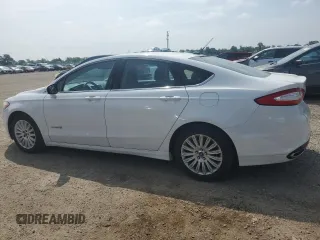 2013 Ford Fusion SE Hybrid z VIN 3FA6P0LU7DR245720, wystawiony jako Copart lot #60231425 z przebiegiem 249 180 mil mil oraz Czysty tytuł • Clean title. Historia ofert i sprzedaży dostępna na DreamBid. Obrazek 2.