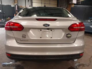 2016 Ford Focus S with VIN 1FADP3E22GL390039, listed as a IAAI auction lot 41958137 with 83,411 mi miles. Bid and sale history available at carsss.com. Image 16.