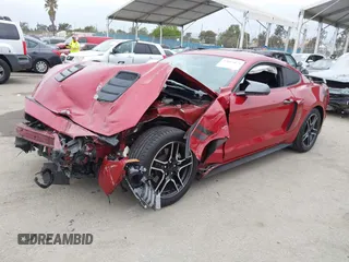 2020 Ford Mustang EcoBoost with VIN 1FA6P8TH4L5189982, listed as a IAAI auction lot 42065871 with 67,942 mi miles. Bid and sale history available at carsss.com. Image 2.