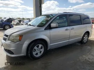 2012 Dodge Grand Caravan SXT with VIN 2C4RDGCG3CR373377, listed as a Copart auction lot 54604805 with 168,067 mi miles and Salvage Title. Bid and sale history available at DreamBid. Image 1.