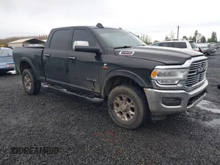 2019 Ram 2500 Laramie with VIN 3C6UR5FL8KG538859, listed as a IAAI auction lot 41999753 with 208,531 mi miles and . Bid and sale history available at DreamBid. Image 1.