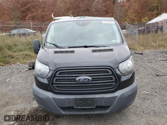 2016 Ford Transit Cargo z VIN 1FTYE1YM4GKA61271, wystawiony jako Copart lot #87135384 z przebiegiem 177 741 mil mil oraz Szkoda całkowita • Salvage title. Historia ofert i sprzedaży dostępna na DreamBid. Obrazek 5.