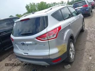 2016 Ford Escape Titanium with VIN 1FMCU9J95GUB93585, listed as a IAAI auction lot 42614106 with 124,465 mi miles and . Bid and sale history available at DreamBid. Image 6.