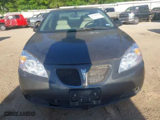 2006 Pontiac G6 GT with VIN 1G2ZH578164171631, listed as a IAAI auction lot 41945854 with 137,457 mi miles. Bid and sale history available at carsss.com. Image 6.