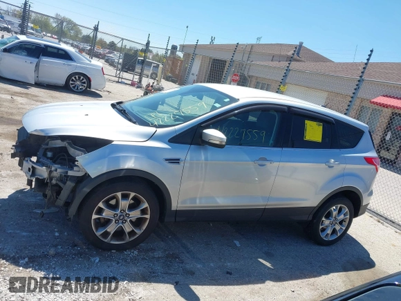 2013 Ford Escape SEL z VIN 1FMCU9H93DUA34811, wystawiony jako IAAI lot #42227559 z przebiegiem 126 495 mil mil oraz . Historia ofert i sprzedaży dostępna na DreamBid. Obrazek 15.