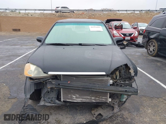 2001 Honda Civic DX with VIN 2HGES15221H525334, listed as a IAAI auction lot 41559664 with 309,641 mi miles. Bid and sale history available at carsss.com. Image 13.