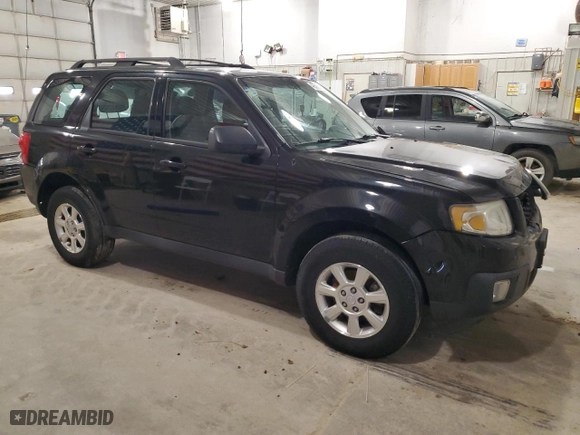 2011 Mazda Tribute Sport with VIN 4F2CY9C74BKM06583, listed as a Copart auction lot 49599745 with 153,464 mi miles and Salvage Title. Bid and sale history available at carsss.com. Image 4.