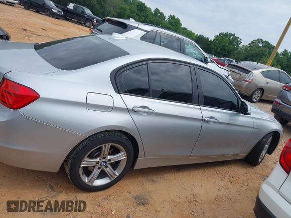 2015 BMW 3 Series 328i with VIN WBA3A5C59FP605386, listed as a IAAI auction lot 42309429 with 164,463 mi miles and . Bid and sale history available at DreamBid. Image 13.
