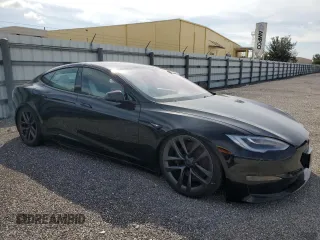 2022 Tesla Model S Plaid z VIN 5YJSA1E64NF461218, wystawiony jako Copart lot #84467644 z przebiegiem Nie podano mil oraz Szkoda całkowita • Salvage title. Historia ofert i sprzedaży dostępna na DreamBid. Obrazek 4.