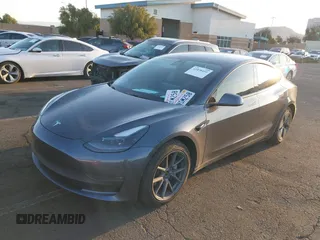 2021 Tesla Model 3 Long Range with VIN 5YJ3E1EBXMF995814, listed as a IAAI auction lot 41838453 with 51,415 mi miles. Bid and sale history available at carsss.com. Image 20.