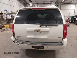 2010 Chevrolet Suburban LTZ with VIN 1GNUKKE31AR290571, listed as a IAAI auction lot 40948006 with 163,758 mi miles. Bid and sale history available at carsss.com. Image 15.