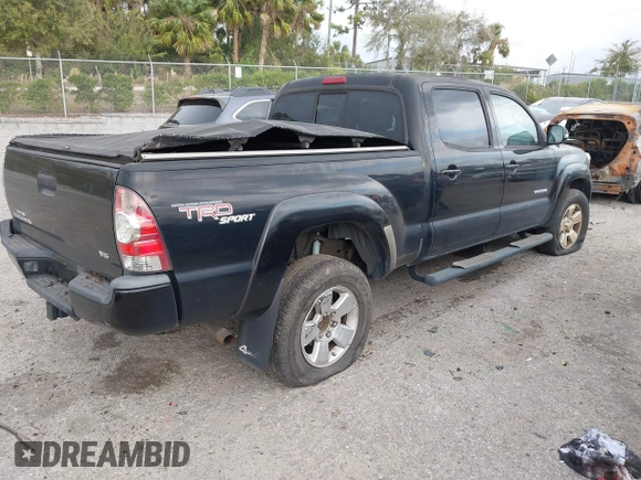 2013 Toyota Tacoma with VIN 3TMMU4FN5DM052257, listed as a IAAI auction lot 41260265 with 121,882 mi miles. Bid and sale history available at carsss.com. Image 4.