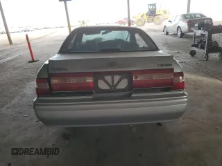 1997 Toyota Crown z VIN JZS1510058113, wystawiony jako Copart lot #84561364 z przebiegiem 71 242 mil mil oraz Szkoda całkowita • Salvage title. Historia ofert i sprzedaży dostępna na DreamBid. Obrazek 6.