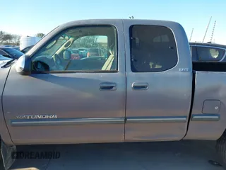2000 Toyota Tundra SR5 with VIN 5TBRT3413YS019873, listed as a IAAI auction lot 41412497 with 305,472 mi miles and . Bid and sale history available at DreamBid. Image 14.