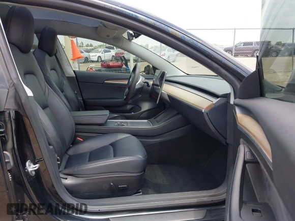 2023 Tesla Model 3 with VIN 5YJ3E1EA8PF454210, listed as a IAAI auction lot 42326822 with 43,200 mi miles and . Bid and sale history available at DreamBid. Image 5.
