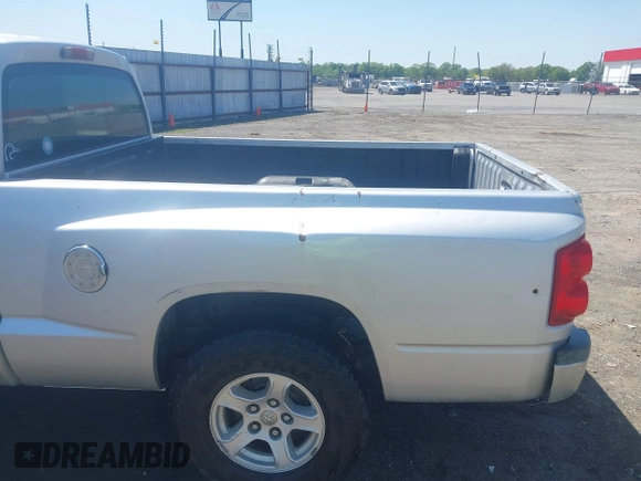 2005 Dodge Dakota SLT with VIN 1D7HE42K95S337682, listed as a IAAI auction lot 41905755 with 145,095 mi miles and . Bid and sale history available at carsss.com. Image 6.