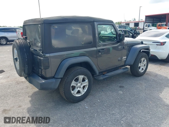 2018 Jeep Wrangler Sport with VIN 1C4GJXAG5JW138437, listed as a IAAI auction lot 42694278 with 58,258 mi miles and . Bid and sale history available at DreamBid. Image 4.