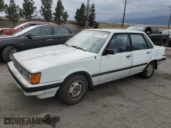1984 Toyota Camry z VIN JT2SV16E3E0220882, wystawiony jako Copart lot #53514345 z przebiegiem 112 430 mil mil oraz Czysty tytuł • Clean title. Historia ofert i sprzedaży dostępna na DreamBid. Obrazek 1.