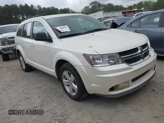 2014 Dodge Journey SE with VIN 3C4PDCABXET135338, listed as a IAAI auction lot 41950088 with 209,944 mi miles. Bid and sale history available at carsss.com. Image 1.