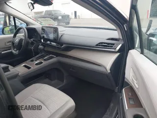2022 Toyota Sienna LE z VIN 5TDKSKFC1NS042455, wystawiony jako IAAI lot #41921094 z przebiegiem 84 810 mil mil oraz . Historia ofert i sprzedaży dostępna na DreamBid. Obrazek 5.