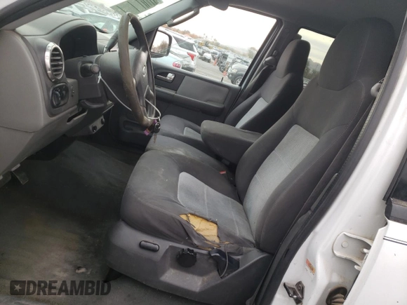 2004 Ford Expedition XLS with VIN 1FMRU13W74LB40774, listed as a Copart auction lot 84467024 with 217,945 mi miles and Salvage Title. Bid and sale history available at carsss.com. Image 7.