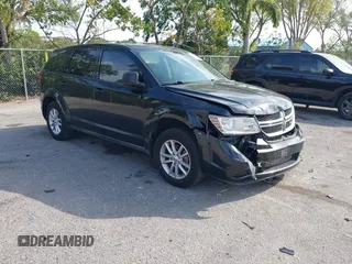 2013 Dodge Journey SE z VIN 3C4PDCAB0DT710609, wystawiony jako IAAI lot #41763431 z przebiegiem 145 851 mil mil oraz . Historia ofert i sprzedaży dostępna na DreamBid. Obrazek 1.