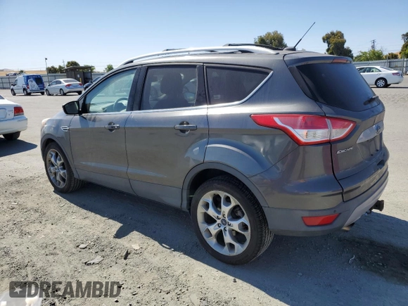 2015 Ford Escape Titanium with VIN 1FMCU9J99FUC13108, listed as a Copart auction lot 60815265 with 70,938 mi miles and Salvage title. Bid and sale history available at DreamBid. Image 2.