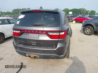 2015 Dodge Durango SXT with VIN 1C4RDJAG8FC939000, listed as a IAAI auction lot 42459660 with 108,101 mi miles and . Bid and sale history available at DreamBid. Image 16.