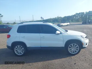 2014 Volkswagen Tiguan SE с VIN WVGAV3AX0EW598528, выставлен на аукционе IAAI как лот 42453851 с пробегом 141 869 миль миль и . История ставок и продаж доступна на DreamBid. Изображение 13.
