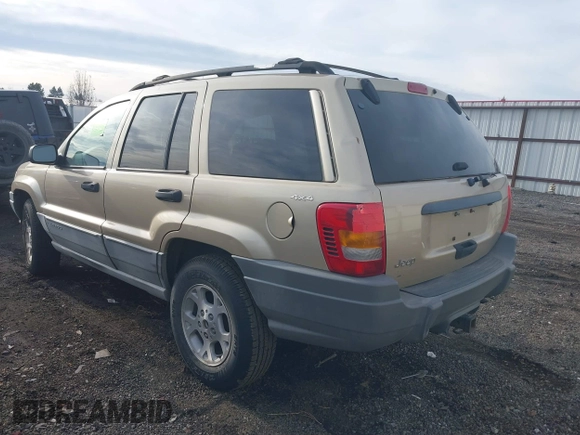 2000 Jeep Grand Cherokee Laredo with VIN 1J4GW48S4YC256978, listed as a IAAI auction lot 40652709 with 117,859 mi miles and . Bid and sale history available at DreamBid. Image 3.