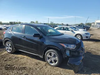 2021 Honda HR-V LX with VIN 3CZRU5H33MM734331, listed as a Copart auction lot 72170614 with 92,706 mi miles and Salvage Title. Bid and sale history available at carsss.com. Image 4.