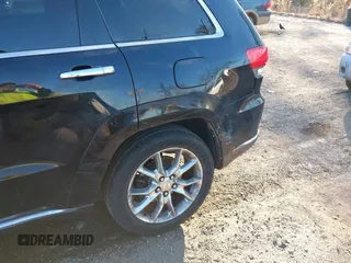 2014 Jeep Grand Cherokee Summit with VIN 1C4RJEJG1EC130727, listed as a IAAI auction lot 41269066 with 205,914 mi miles and . Bid and sale history available at DreamBid. Image 6.