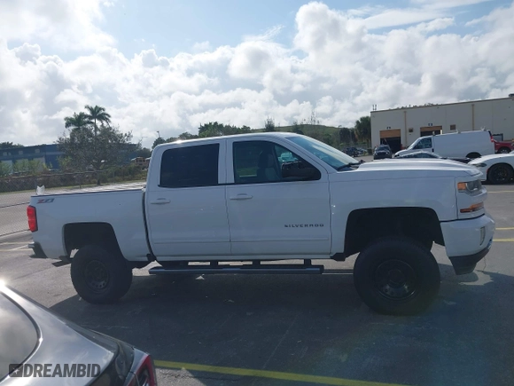 2016 Chevrolet Silverado 1500 LT with VIN 3GCUKREC3GG116107, listed as a IAAI auction lot 41490638 with 93,669 mi miles. Bid and sale history available at carsss.com. Image 13.