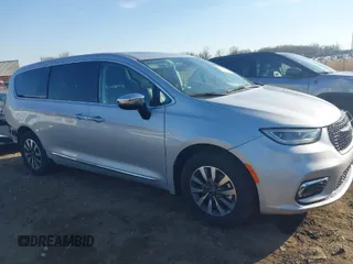 2023 Chrysler Pacifica Hybrid Limited with VIN 2C4RC1S72PR588627, listed as a IAAI auction lot 42063631 with 52,799 mi miles and . Bid and sale history available at DreamBid. Image 1.