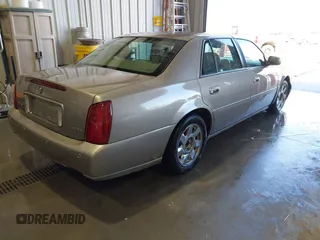 2001 Cadillac DeVille DTS with VIN 1G6KF57911U263913, listed as a IAAI auction lot 41744490 with 100,235 mi miles. Bid and sale history available at carsss.com. Image 4.