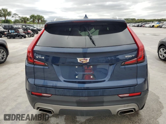 2021 Cadillac XT4 FWD Premium Luxury z VIN 1GYFZCR48MF056210, wystawiony jako Copart lot #45818245 z przebiegiem Nie podano mil oraz Nie do naprawy • Non repairable. Historia ofert i sprzedaży dostępna na DreamBid. Obrazek 6.