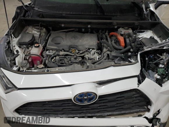 2021 Toyota RAV4 Hybrid XLE with VIN JTMRWRFV3MD127501, listed as a Copart auction lot 84239034 with 75,707 mi miles and Salvage Title. Bid and sale history available at carsss.com. Image 13.