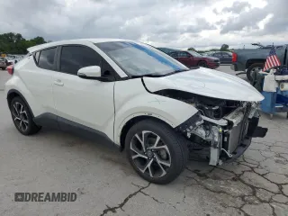 2018 Toyota C-HR XLE с VIN NMTKHMBX6JR016848, выставлен на аукционе Copart как лот 56939615 с пробегом 65 510 миль миль и Списание • Salvage title. История ставок и продаж доступна на DreamBid. Изображение 4.