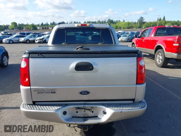 2004 Ford Explorer Sport Trac XLS z VIN 1FMDU77K74UB69268, wystawiony jako IAAI lot #42055157 z przebiegiem 127 573 mil mil oraz . Historia ofert i sprzedaży dostępna na DreamBid. Obrazek 16.