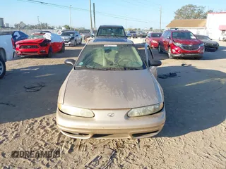 2004 Oldsmobile Alero GL1 z VIN 1G3NL52E34C191243, wystawiony jako IAAI lot #41536825 z przebiegiem 117 998 mil mil oraz . Historia ofert i sprzedaży dostępna na DreamBid. Obrazek 12.