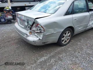 2002 Toyota Avalon XL with VIN 4T1BF28B12U234616, listed as a IAAI auction lot 41954288 with 148,418 mi miles. Bid and sale history available at carsss.com. Image 20.