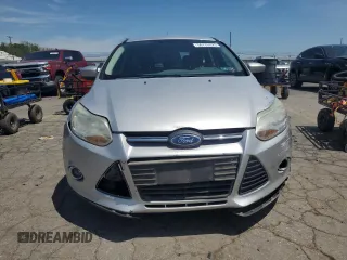2012 Ford Focus SE z VIN 1FAHP3K2XCL270196, wystawiony jako Copart lot #57319575 z przebiegiem 80 364 mil mil oraz Szkoda całkowita • Salvage title. Historia ofert i sprzedaży dostępna na DreamBid. Obrazek 5.