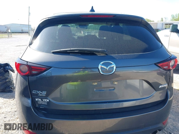 2018 Mazda CX-5 Grand Touring with VIN JM3KFBDM7J0454836, listed as a IAAI auction lot 42001397 with 146,879 mi miles. Bid and sale history available at carsss.com. Image 16.