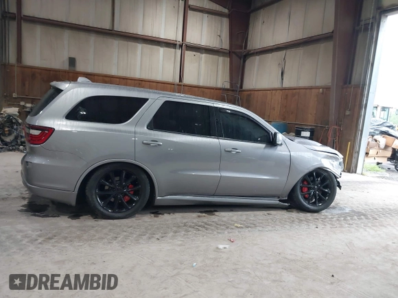 2017 Dodge Durango R/T with VIN 1C4SDJCT0HC799202, listed as a IAAI auction lot 42295142 with 83,103 mi miles and . Bid and sale history available at DreamBid. Image 14.