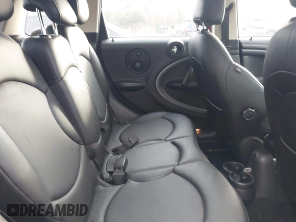 2015 MINI Countryman S with VIN WMWZC3C50FWT05122, listed as a IAAI auction lot 41572503 with 120,885 mi miles and . Bid and sale history available at DreamBid. Image 8.