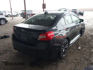 2016 Subaru WRX Premium with VIN JF1VA1E67G8833513, listed as a IAAI auction lot 41610329 with 95,277 mi miles. Bid and sale history available at carsss.com. Image 4.
