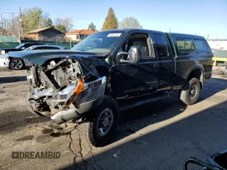 2001 Ford F-250 XL z VIN 1FTNX21SX1EA80232, wystawiony jako Copart lot #56067955 z przebiegiem 188 119 mil mil oraz Szkoda całkowita • Salvage title. Historia ofert i sprzedaży dostępna na DreamBid. Obrazek 1.