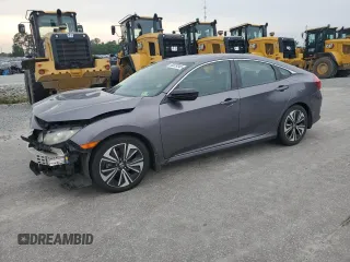 2017 Honda Civic EX-L with VIN 19XFC1F79HE023937, listed as a Copart auction lot 56829345 with 228,546 mi miles and Salvage title. Bid and sale history available at DreamBid. Image 1.